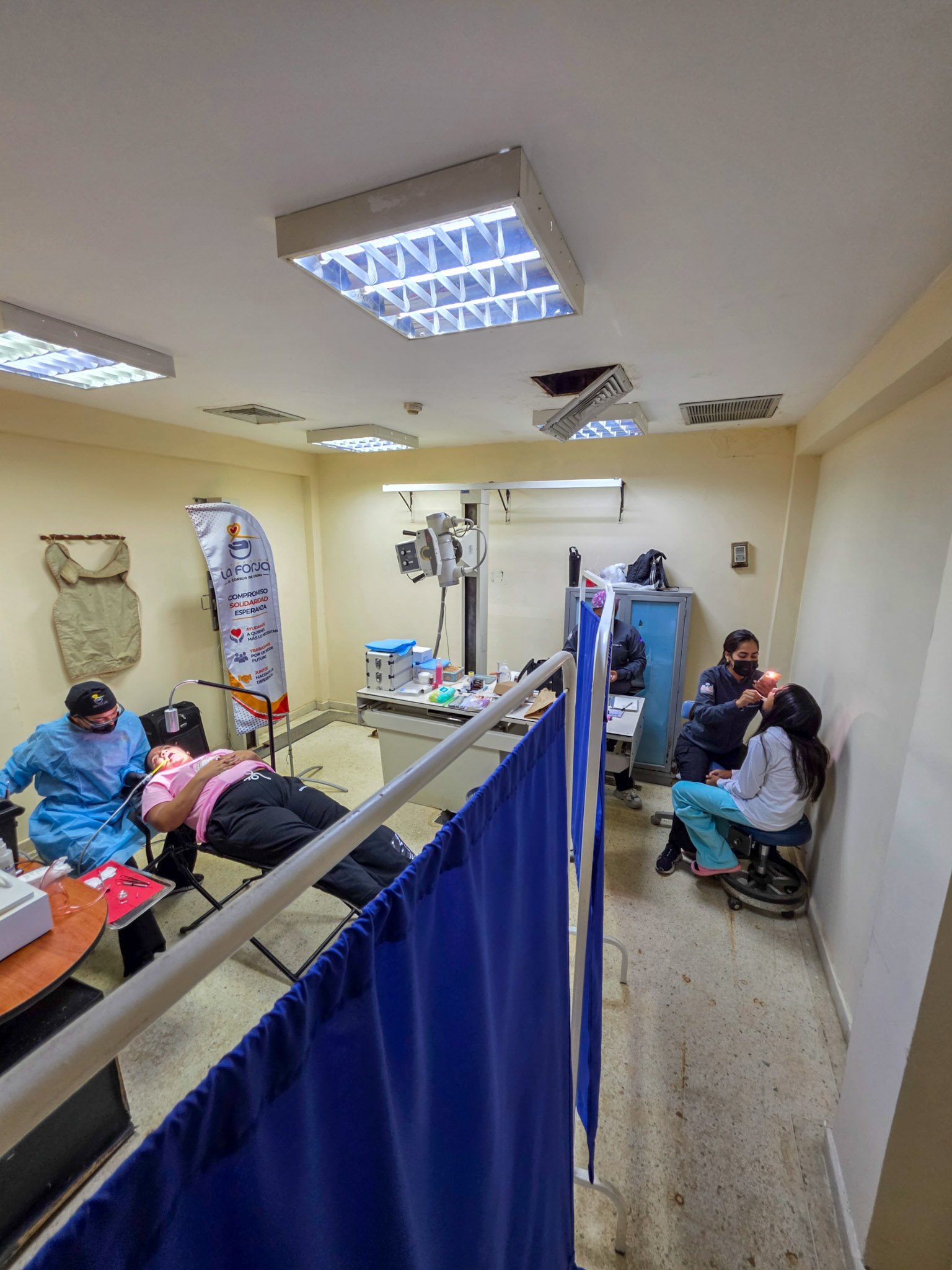 La Forja Foundation doctor performing a medical check-up on a young girl during the Consejo de Ciruma health drive.