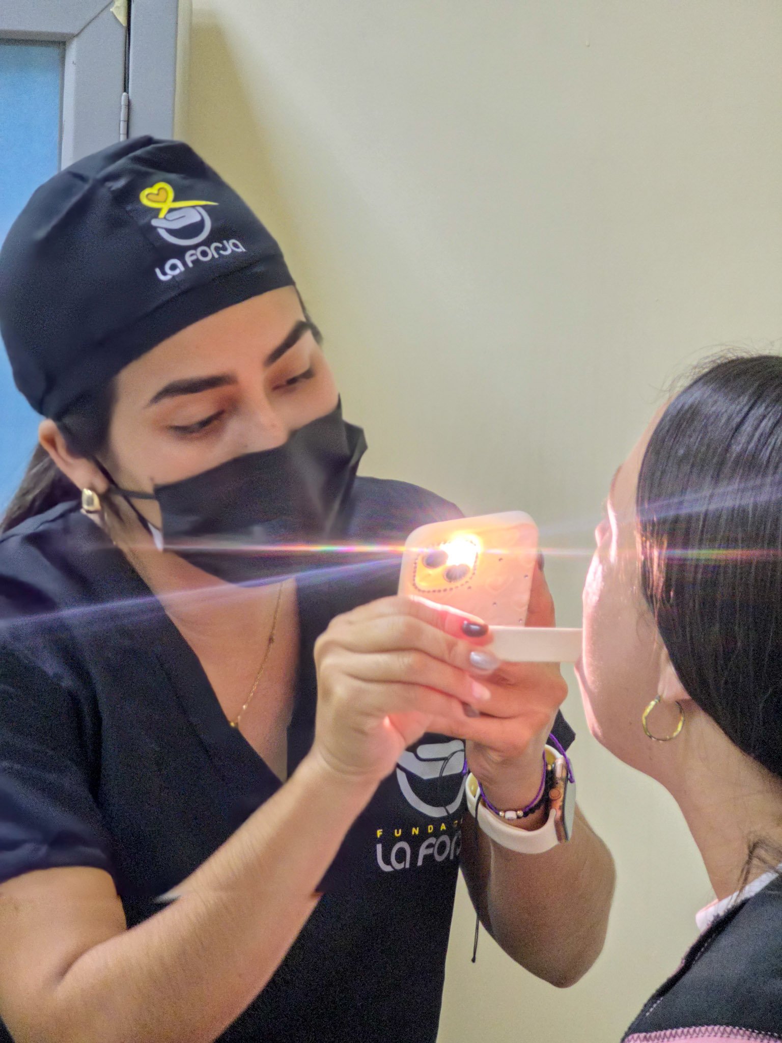La Forja Foundation doctor performing a medical check-up on a young girl during the Consejo de Ciruma health drive.