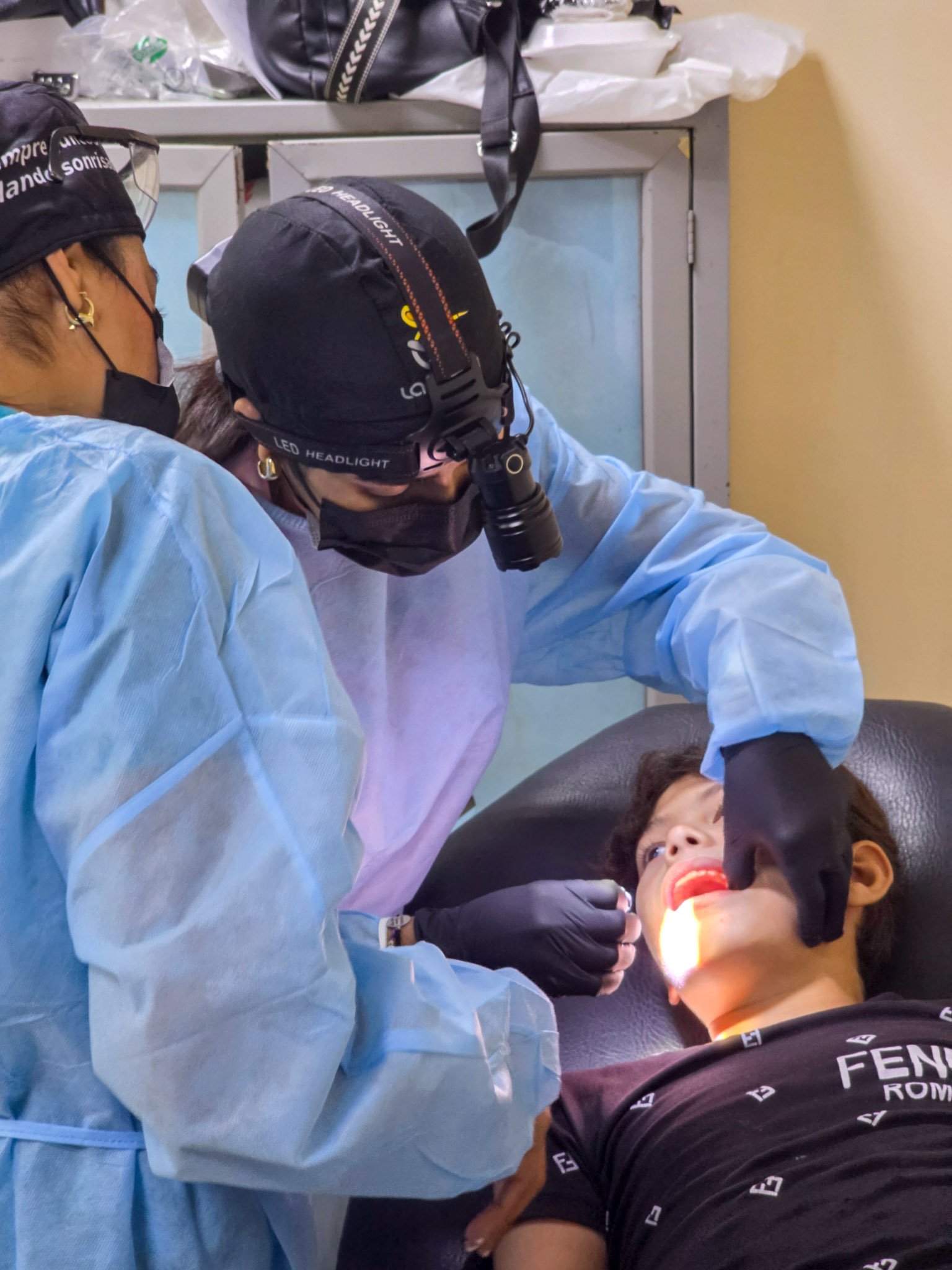 La Forja Foundation doctor performing a medical check-up on a young girl during the Consejo de Ciruma health drive.