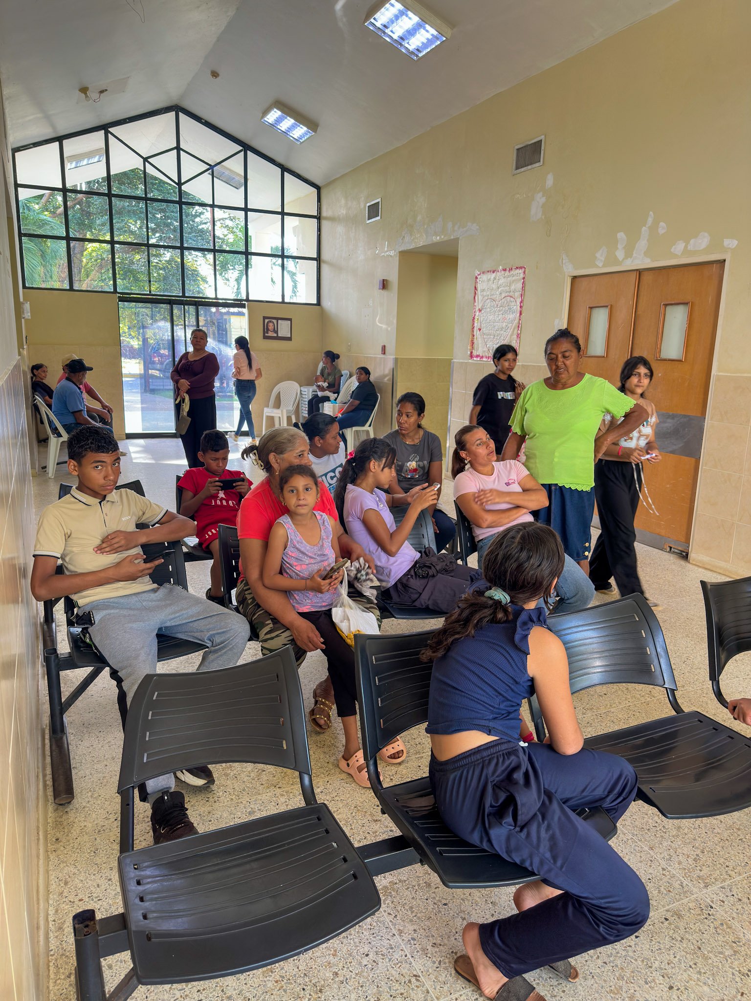 La Forja Foundation doctor performing a medical check-up on a young girl during the Consejo de Ciruma health drive.